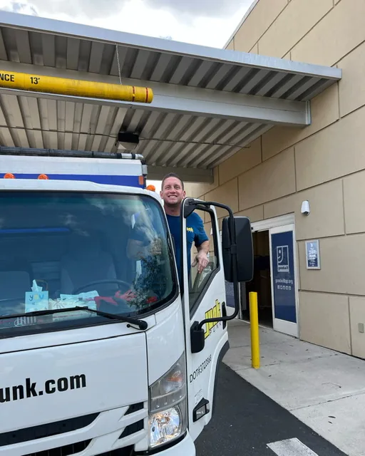 Junk Punk truck dropping off donations at Goodwill in Huntersville